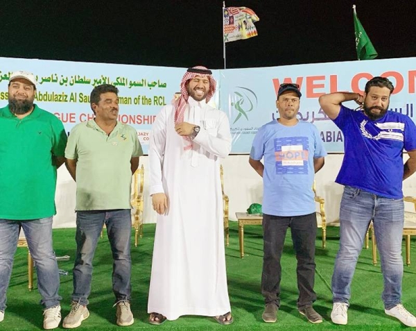 Prince Abdullah Bin Sultan Bin Nasir, RCL Deputy Chairman, standing with Hanif Baber (on his right) at function.