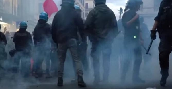 Several hundred people clashed with police in central Rome on Saturday evening.