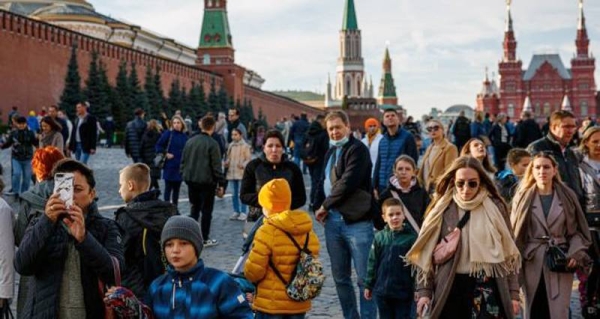 Russia hit another record of daily coronavirus deaths Tuesday as the country struggled with a rapid surge of infections and lagging vaccination rates, but authorities have been adamant that there would be no new national lockdown.