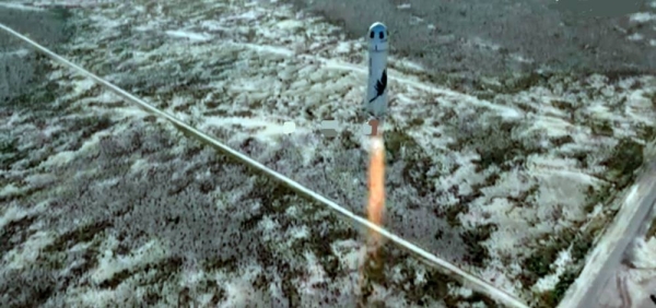 The Blue Origin rocket, with actor William Shatner onboard, lifts off from the launch pad.