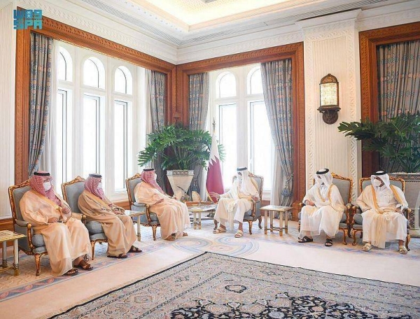 Emir of Qatar Sheikh Tamim bin Hamad Al Thani receives Prince Turki bin Mohammed bin Fahd bin Abdulaziz at his office in Doha on Thursday.