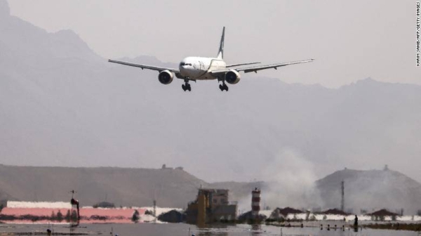 A Pakistan International Airlines plane lands at Kabul airport on September 13.