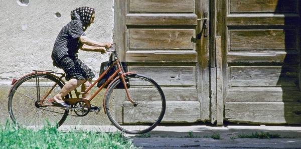 An elderly woman rides her bike in Croatia (13 February 2013). World Health Organization (WHO) has a new advocacy brief, Fair Play: Building a strong physical activity system for more active people. — courtesy World Bank/Miso Lisanin