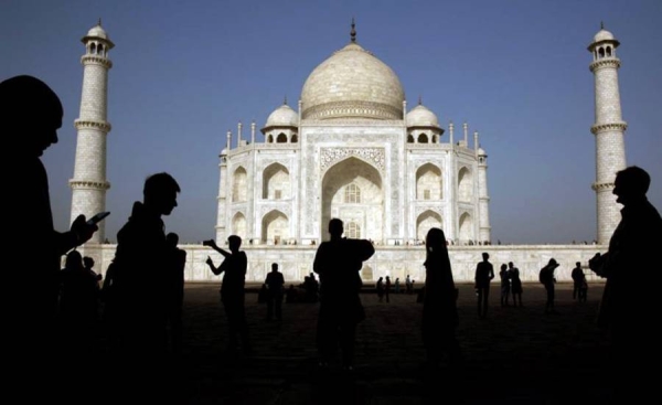 India offers a large number of tourist attractions such as the Taj Mahal, seen in this file photo, monument, temples and forts, the snowy mountain peaks of the Himalayas and the white sandy beaches in the west and south.