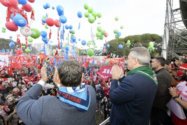 Tens of thousands of union members and other Italians gathered in Rome to stand up against rising fascism on Saturday, a week after right-wing extremists forced their way into the headquarters of Italy's most powerful labor confederation while protesting a COVID-19 certification requirement for workplaces.
