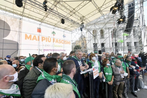 Tens of thousands of union members and other Italians gathered in Rome to stand up against rising fascism on Saturday, a week after right-wing extremists forced their way into the headquarters of Italy's most powerful labor confederation while protesting a COVID-19 certification requirement for workplaces.