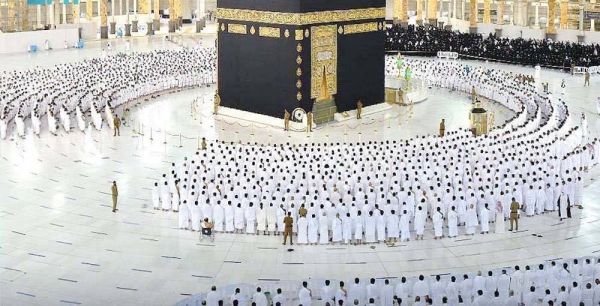 A Muslim boy performs Al-Fajr prayer Sunday at the Grand Mosque amid atmosphere full of faith.