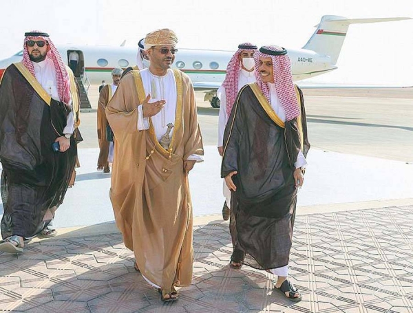 Prince Faisal Bin Farhan, Minister of Foreign Affairs, being handed the letter Monday by Omani Foreign Minister Sayyid Badr Bin Hamad Bin Hamoud Al-Busaidi during a meeting Monday.