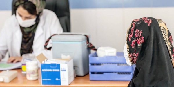 File photo shows a woman attends a consultation before receiving her COVID-19 vaccination in Herat city, Afghanistan. — courtesy UNICEF/Sayed Bidel