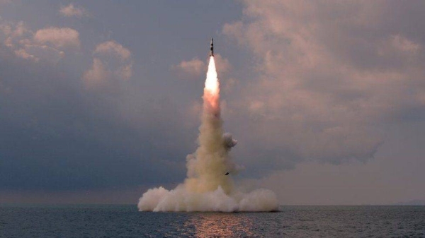 A photo released on 19 October by KCNA apparently showing a test of a new North Korean submarine-launched ballistic missile.