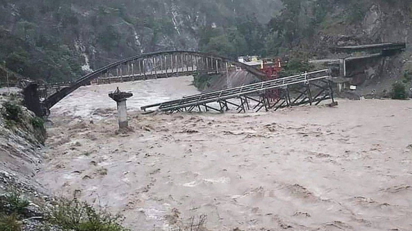 Overflowing rivers have swept away bridges in the northern Indian state of Uttarkhand.