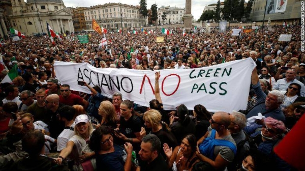 People gather in Piazza del Popolo square during a protest against the Covid-19 health pass, in Rome, Saturday, October 9.