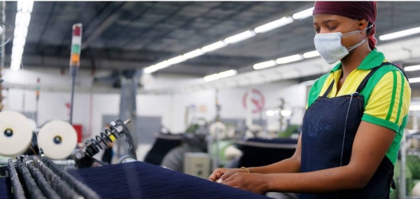 A woman works in a garment factory in Lesotho.