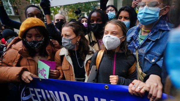 Greta Thunberg joined activists protesting outside major banks in the City of London on Friday.