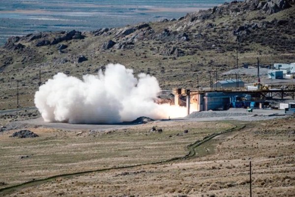An overhead photo of the 34.5” CPS missile body and first stage rocket motor firing during the static rocket motor test on Oct. 28, 2021 at Promontory, Utah. This is the first time the test included a thrust-vectoring control system for the rocket motor. — courtesy Northrop Grumman photo.