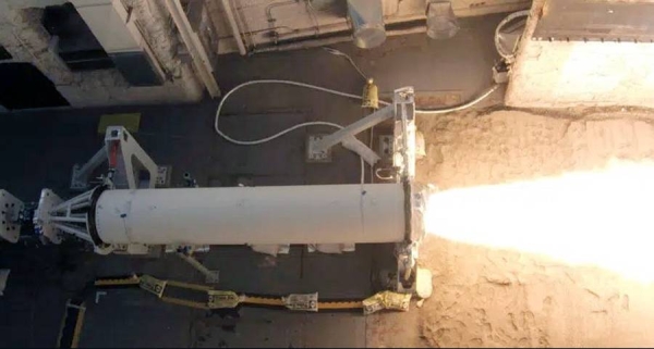 An overhead photo of the 34.5” CPS missile body and first stage rocket motor firing during the static rocket motor test on Oct. 28, 2021 at Promontory, Utah. This is the first time the test included a thrust-vectoring control system for the rocket motor. — courtesy Northrop Grumman photo.