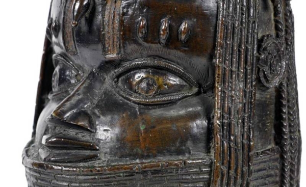 A Scottish university will on Thursday hand over to a Nigerian delegation a Benin Bronze that was among thousands looted by British troops in 1897, the third European institution in two days to return cultural artifacts to their African homelands.