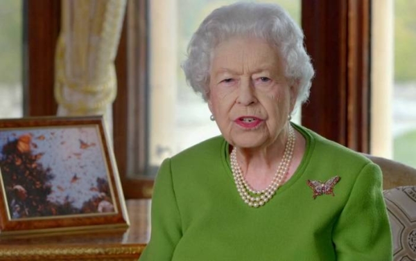 The Queen making her speech as seen on a screen at a reception at the COP26 summit.