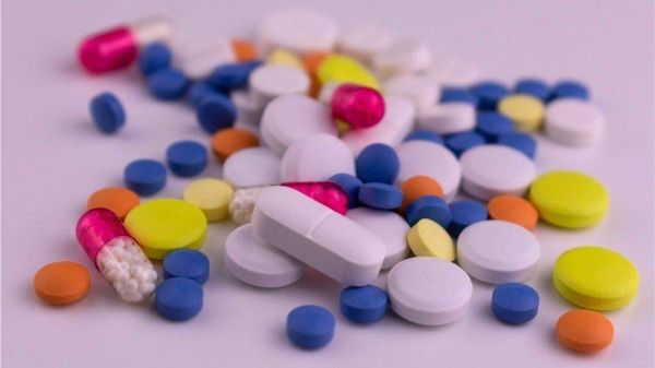 The Pfizer drug, known as a protease inhibitor, is designed to block an enzyme the virus needs in order to multiply.