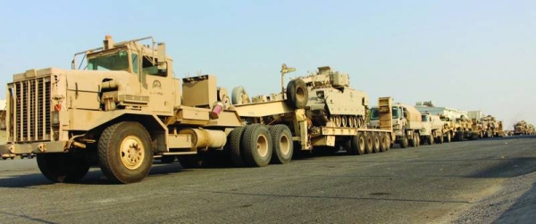 Royal Saudi Land Forces arrive in Kuwait on Sunday through Nuwaiseeb border crossing .