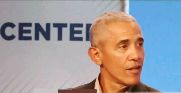 Former US President Barack Obama speaks at the COP26 UN Climate Summit in Glasgow, Scotland, Monday.