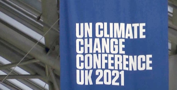 A draft of the COP26 agreement published on Wednesday includes language that says the world should be aiming to limit global warming to 1.5 degrees Celsius and acknowledges the role of fossil fuels in the climate crisis, a first for the annual Conference of the Parties on climate.