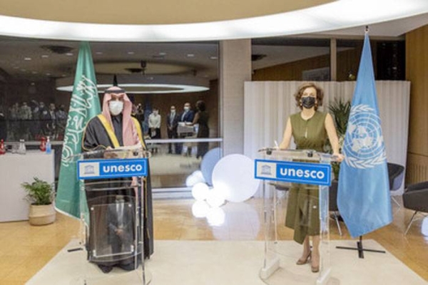 Prince Badr Bin Abdullah Bin Farhan, governor of Royal Commission for AlUla and Minister of Culture, and Audrey Azoulay, director general, UNESCO sign long-term strategic partnership to preserve AlUla's heritage and accelerate its renaissance — courtesy PRNewsfoto/The Royal Commission for AlUla