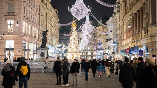 Crowds in the Austrian capital, Vienna. About 65% of Austria's population is fully vaccinated.