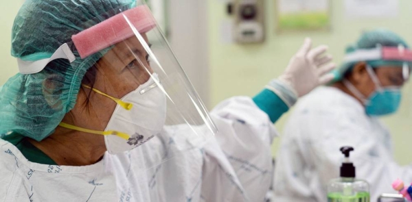 COVID-19 frontline workers wear personal protective equipment at a hospital in Thailand. (file) — courtesy UN Women/Pathumporn Thongking