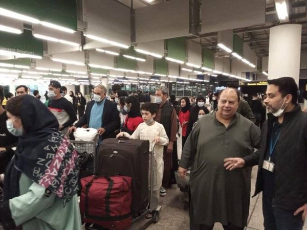 The girls and their families arrive in the UK from Pakistan.