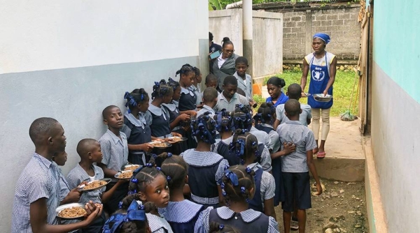 Lunch for 307 children is prepared at a school in south-west Haiti. — courtesy UN Haiti/Daniel Dickinson