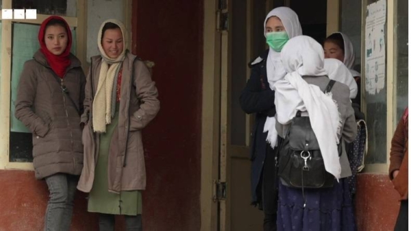 BBC's John Simpson met teenage girls who returned to school in the Afghan town of Bamiyan.