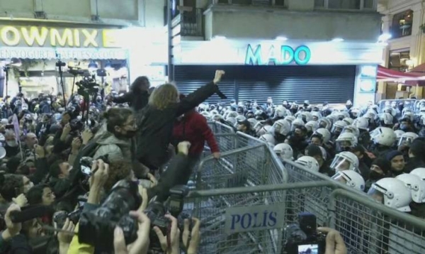 Turkish police clash with protesters at the march in Istanbul.