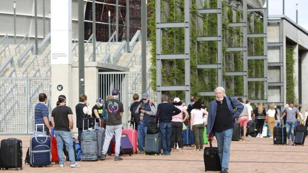 Stranded German tourists gather at the Cape Town Stadium in Cape Town, South Africa, Thursday, April 23, 2020. (File photo)