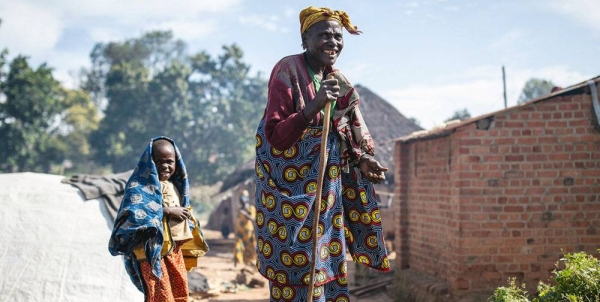 Families shelter at a church that is being used as a temporary site for internally displaced people in Ituri, Democratic of the Congo. — courtesy UNHCR/John Wessels