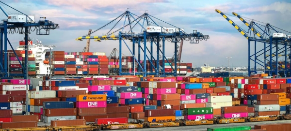 Shipping containers are loaded onto vessels at a port in Los Angeles, USA.
