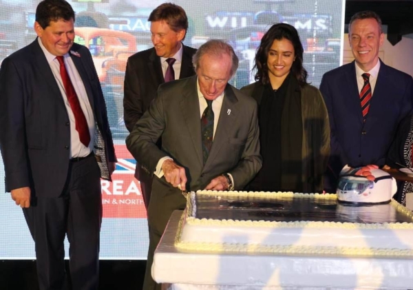 British Ambassador to Saudi Arabia Neil Crompton, Consul General Seif Usher, Saudi Motorsport Company CEO Martin Whitaker and Saudi Arabia’s first female professional racing driver Reema Juffali attend the cake cutting ceremony during the reception hosted by the British Consulate General in Jeddah on Wednesday.

