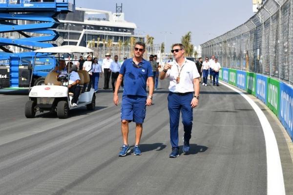 Michael Masi, Race Director, walks the track with an FIA colleague.