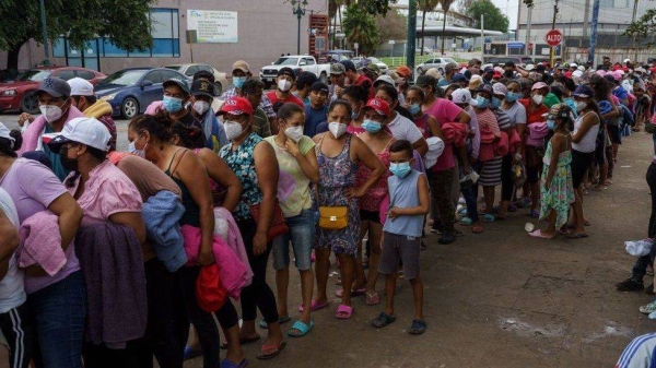 Migrants on the Mexican side of the border.