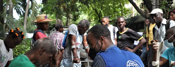 IOM distributed crutches and wheelchairs to people with disabilities.