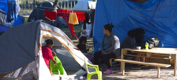 Asylum seekers, including children, at the Matamoros camp awaiting their US immigration hearings in Mexico.