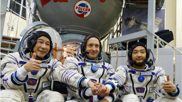 Russian cosmonaut Alexander Misurkin (C) and space flight participants Japanese billionaire Yusaku Maezawa (L) and his assistant Yozo Hirano attend a training ahead of the expedition to the International Space Station, in Star City outside Moscow in October.