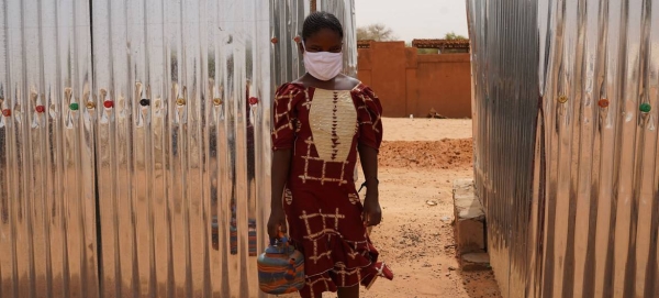 A young migrant from Niger is being accommodated in a UN-supported camp in Burkina Faso.