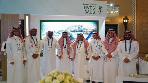 Saudi officials receive visitors at the Invest in Saudi pavilion at the annual forum of the Gulf Petrochemicals and Chemicals Association (GPCA) in Dubai.