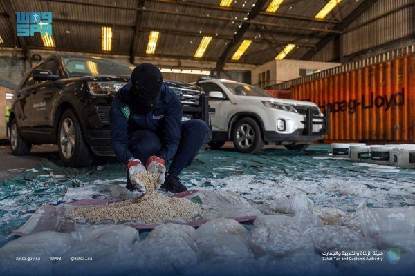 Customs officers display amphetamine pills seized at the Jeddah port in the latest drug haul in the country.