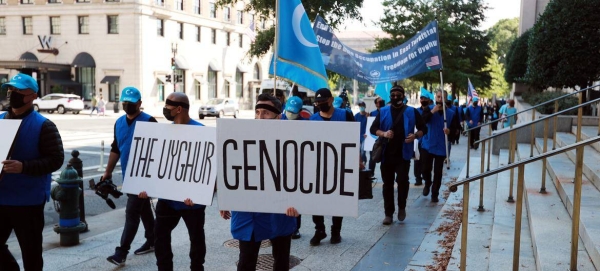 Protesters in Washington march against the killing of Uyghur Muslims.