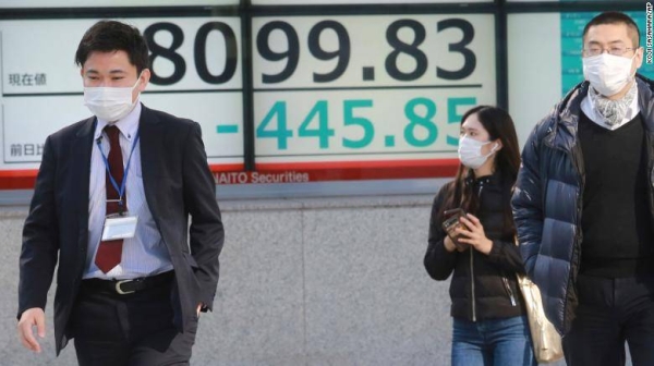 Asian stock markets followed Wall Street lower on Monday amid concern about the coronavirus's latest variant and tighter Federal Reserve policy.