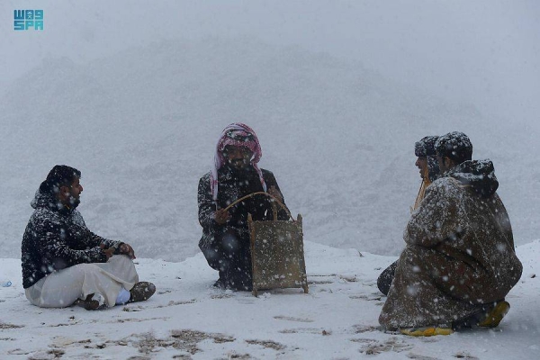 The peak of Jabal al-Lawz was completely covered in white, as the Tabuk region witnessed heavy rain and snowfall since the early morning hours on Saturday.
