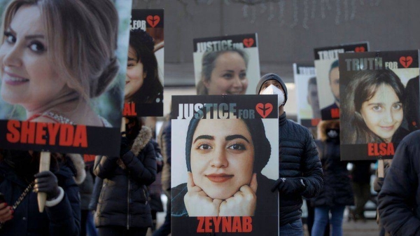 Images of the victims were displayed during an event marking the first anniversary of the tragedy in Toronto last year.
