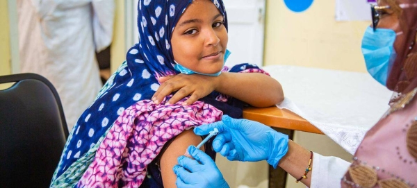 A young girl receives one of the first doses of the Human Papillomavirus (HPV) vaccine in Mauritania.
